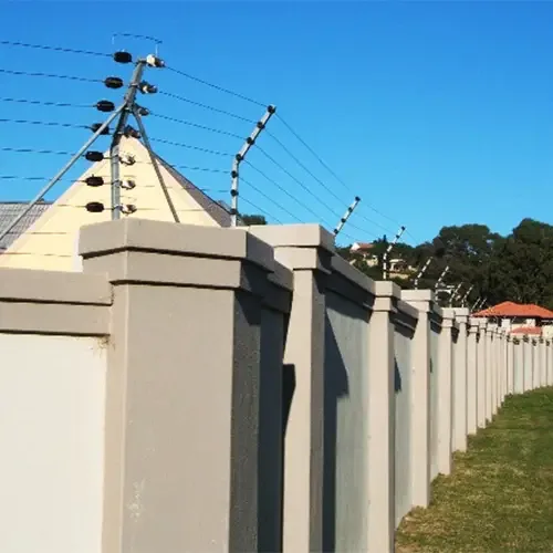 Illustrative photo of electric fencing along a perimeter wall
